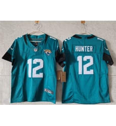 Women Jacksonville Jaguars 12 Travis Hunter Teal 2024 F U S E Vapor Limited Stitched Football Jersey  Women Jacksonville Jaguars 12 Travis Hunter Teal 2024 F U S E Vapor Limited Stitched Football Jersey